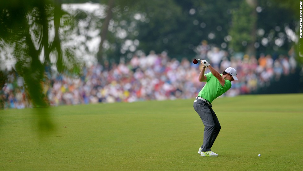 Rory McIlroy hits his second shot on the second hole.