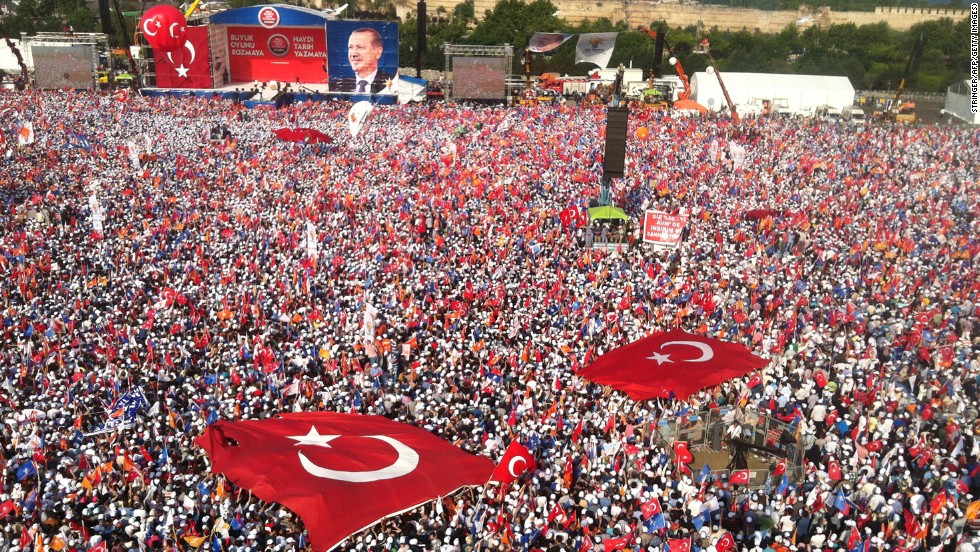 Tens of thousands attend a rally to hear Turkish Prime Minister Recep Tayyip Erdogan speak in Istanbul on June 16, a day after he ordered a crackdown on anti-government protesters at Gezi Park. 