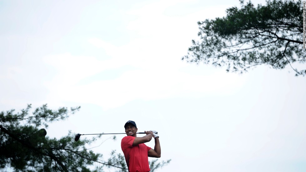 Tiger Woods hits from the 5th tee during the fourth round on June 16.