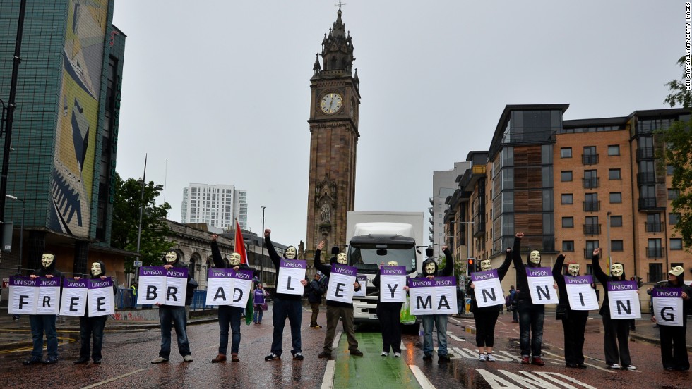 Protesters wearing Guy Fawkes masks on June 15 in Belfast hold placards spelling out the message &quot;Free Bradley Manning,&quot; referring to the U.S. soldier &lt;a href=&quot;http://www.cnn.com/2013/06/02/us/manning-court-martial/index.html&quot;&gt;who has admitted&lt;/a&gt; passing sensitive U.S. government material to the leak website WikiLeaks.