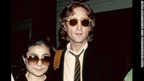 Former Beatle John Lennon and his wife, Yoko Ono, leave a New York recording studio in August 1980. 