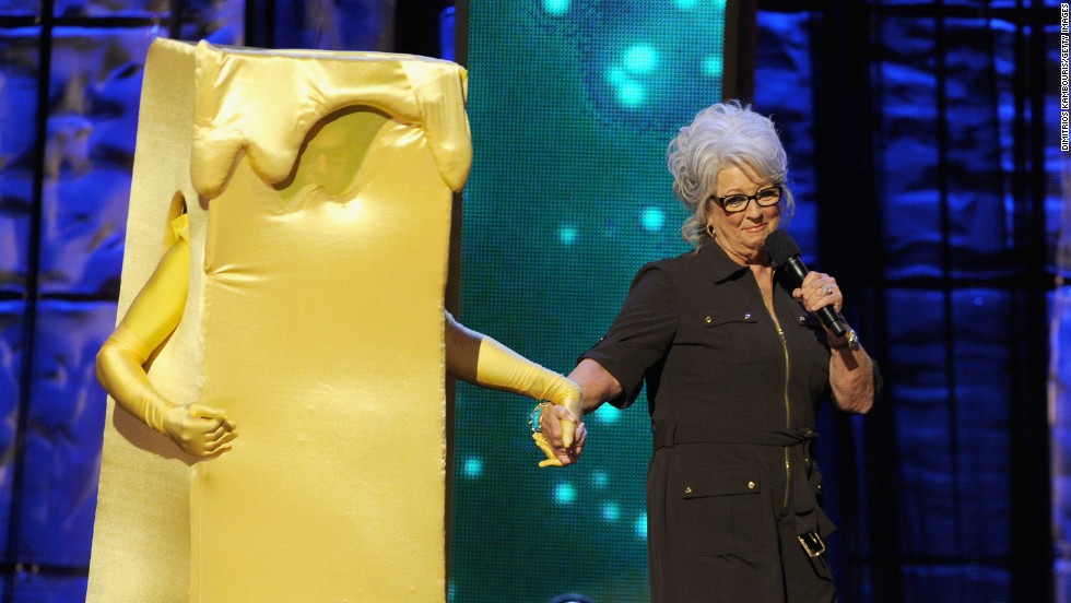 Deen on stage with a costumed Kevin Bacon at Comedy Central&#39;s &quot;Night of Too Many Stars: America Comes Together for Autism Programs&quot; in 2012 in New York.