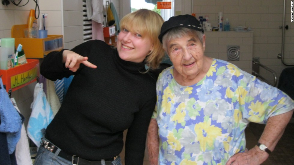 Resident Lydia Stehwin and personal care assistant Anica Szücs enjoy each other&#39;s company.