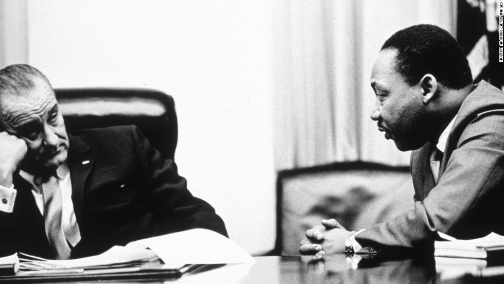 President Lyndon Johnson, pictured here discussing the act with the Rev. Martin Luther King Jr. in 1965, went on national television to call for passage of the Voting Rights Act. He ended his speech by saying, &quot;And we shall overcome.&quot;
