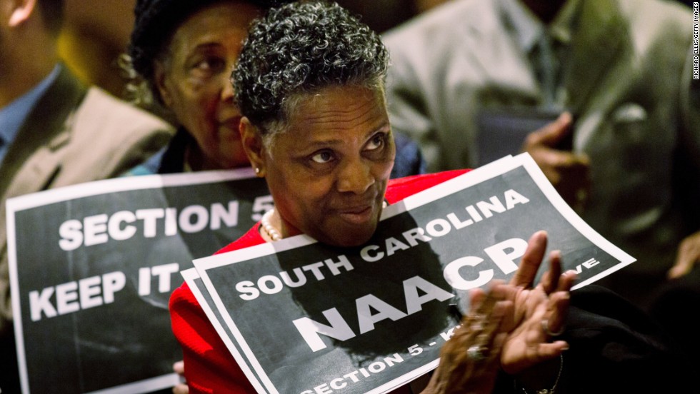 A supporter of the Voting Rights Act  rallies in the South Carolina State House in Columbia on February 26, 2013, the day before oral hearings at the Supreme Court.