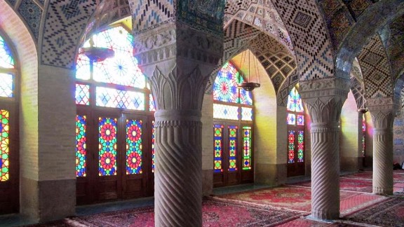 The columns, vaults, rugs and stained glass in this winter prayer hall at the Masjed-e Nasir-al-Molk Mosque in Shiraz create a serene atmosphere.