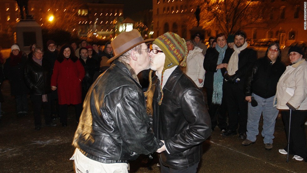 Olin Burkhart, left, and Carl Burkhart kiss on the steps of the New Hampshire Capitol on January 1, 2010, after the state&#39;s law allowing same-sex marriage went into effect.