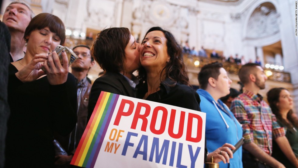 A couple celebrates at San Francisco City Hall upon hearing about the U.S. Supreme Court rulings on same-sex marriage on June 26, 2013. The high court cleared the way for same-sex couples in California to resume marrying after dismissing an appeal on Proposition 8 on jurisdictional grounds. The court also struck down a key part of the Defense of Marriage Act, a 1996 federal law defining marriage as between a man and a woman. 