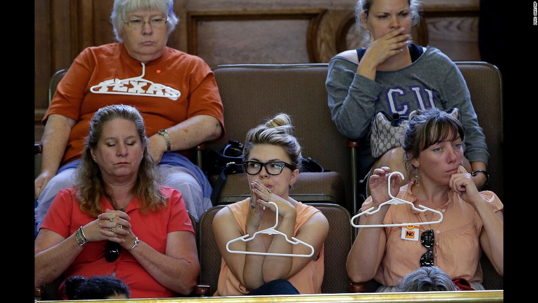Opponents of the bill sat in the gallery holding hangers. Among the changes Davis and others opposed: requiring abortion clinics to become ambulatory surgical center and requiring doctors who perform abortions to have admitting privileges at nearby hospitals.