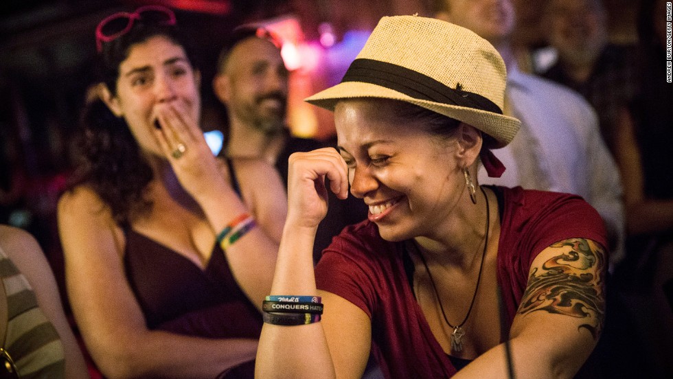 Richelle Spanover, right, celebrates at the Stonewall Inn in New York after the Supreme Court rulings. The Stonewall riots in 1969 sparked the modern gay rights movement.