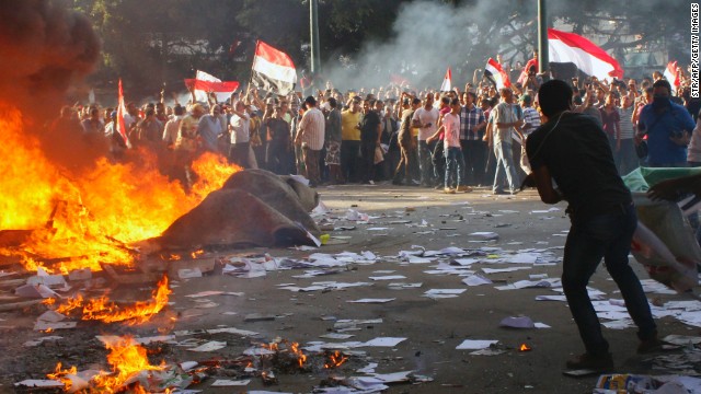 Opponents of President Mohamed Morsi burn the contents of a Freedom and Justice Party office in Alexandria on Friday. 
