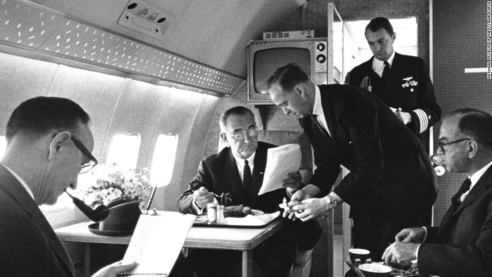 President Johnson is seen here meeting with Sens. Mike Mansfield, left, and J. William Fulbright, far right. All presidents aboard Air Force One used it to multitask. For example, at a 1964 campaign stop, LBJ gave an impromptu press conference on the plane while he changed clothes.