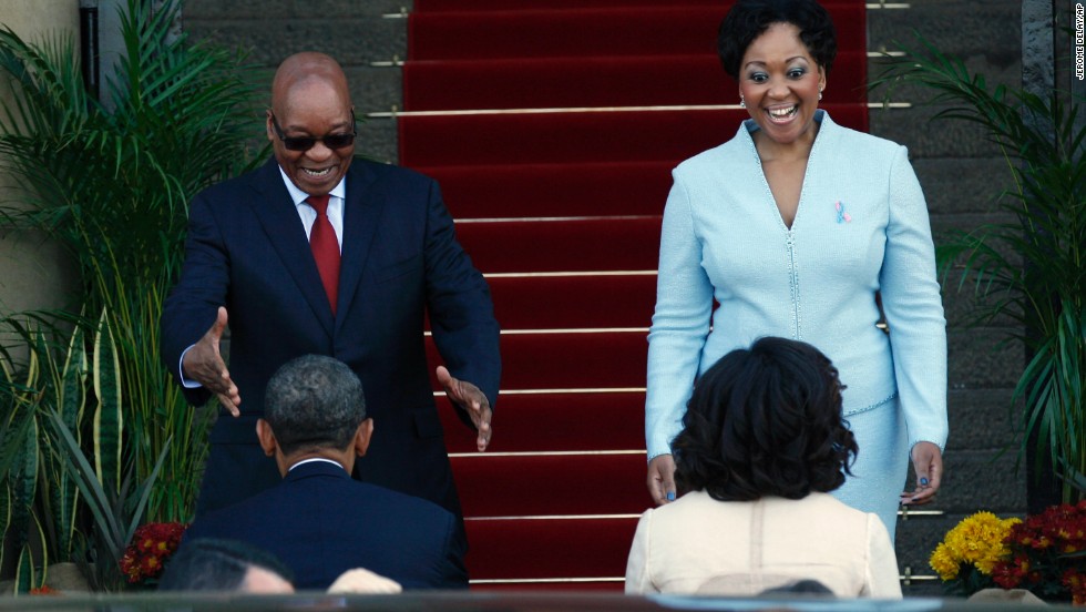 Obama, foreground left, and first lady Michelle Obama, beside him, are greeted by South African President Jacob Zuma and his wife, Tobeka Madiba Zuma, on the steps of the Union Buildings upon their arrival in Pretoria, South Africa, on Saturday June 29.