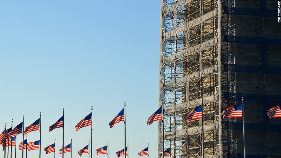 The Washington Monument is closed for repairs following the 2011 earthquake in DC, but the ring of flags still fly.