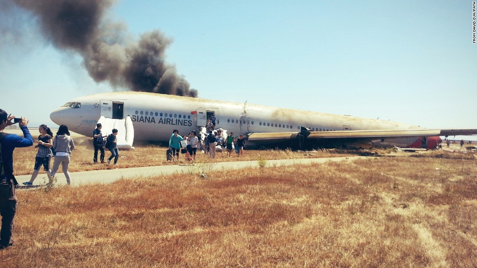 David Eun, a passenger on Asiana Airlines Flight 214, posted this image to Path.com along with the message, &quot;I just crash landed at SFO. Tail ripped off. Most everyone seems fine, I&#39;m ok. Surreal...&quot; It was one of the first photographs taken after the crash.