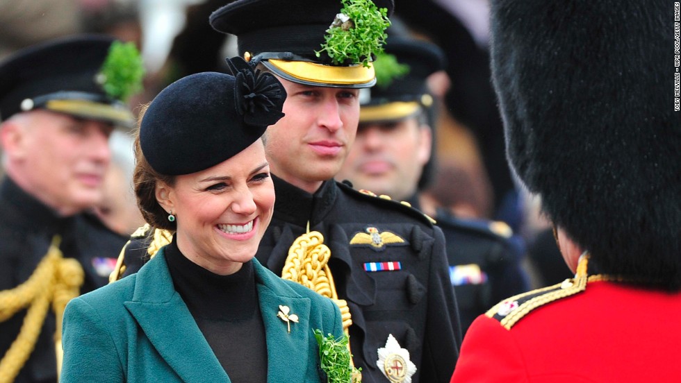 The couple attends a St. Patrick&#39;s Day parade as they visit Aldershot, England, in March 2013.
