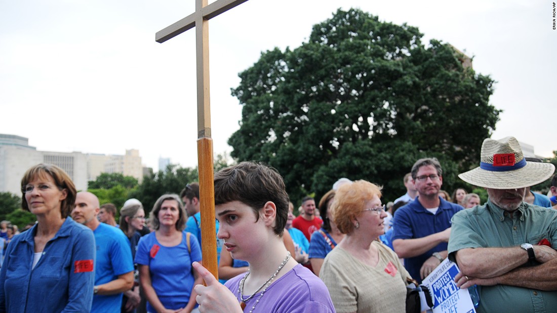 Supporters of an abortion bill listen to speakers at a July 2013 rally organized by the Texas Right to Life Organization.