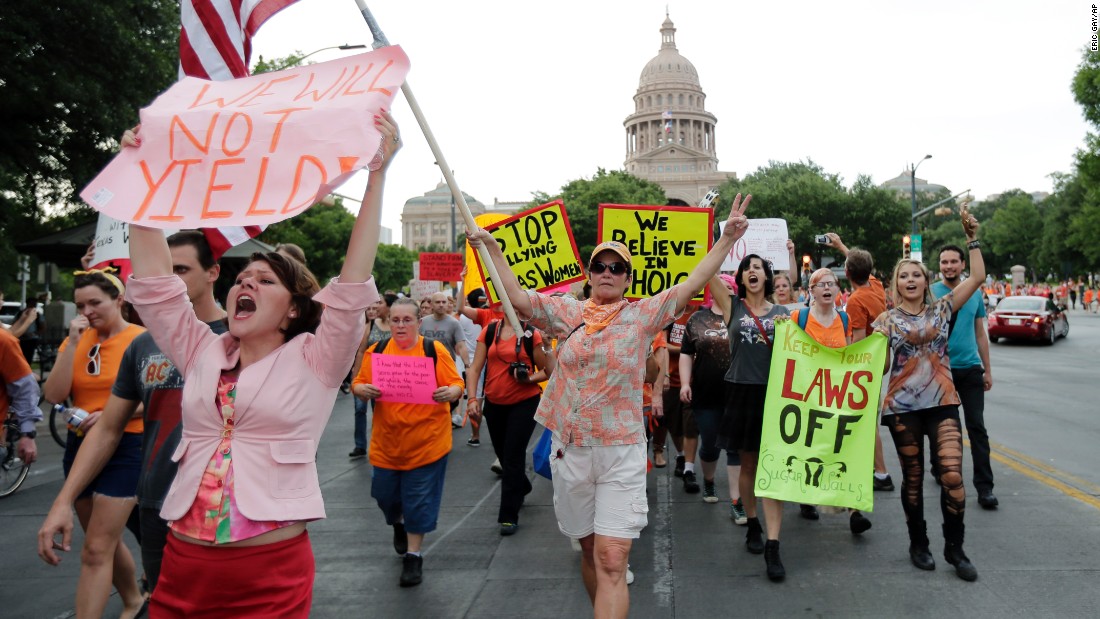 Abortion-rights activists march from the Capitol in July 2013.