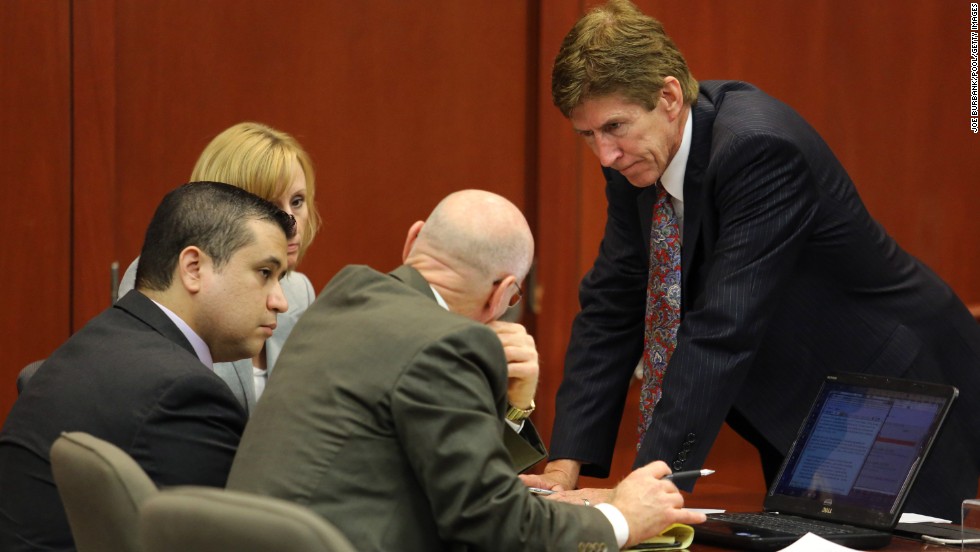 Zimmerman confers with his defense team on July 13, after working out the wording for a response to the jury, who had asked for clarification on the instructions regarding manslaughter. The response, crafted and agreed to by both the prosecution and defense, instructed the jury to ask their question more specifically, as the court could not engage in general discussion.