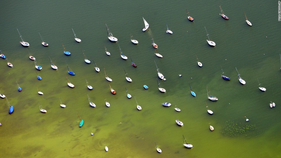 Sailboats dot Lake Ammersee, near Herrsching, in southern Germany on Saturday, July 13.