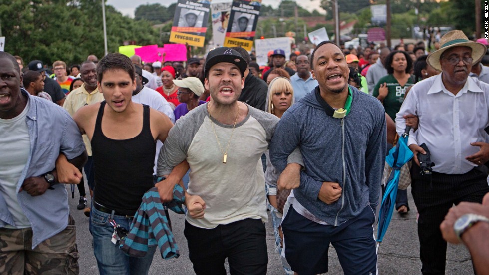 A large group of demonstrators march through downtown Atlanta on July 15 during a protest of the acquittal of George Zimmerman.