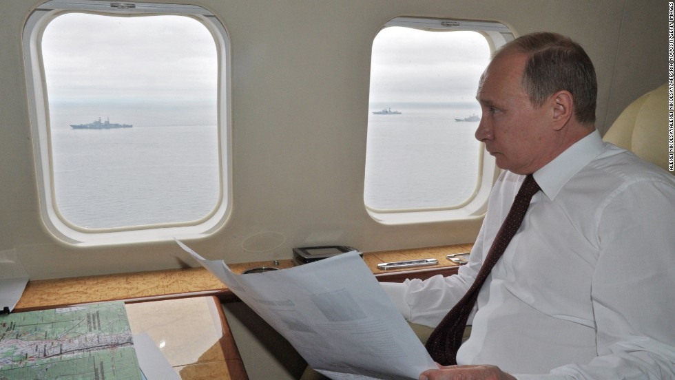 Russian President Vladimir Putin inspects military exercises near Sakhalin Island in the Pacific Ocean, on Tuesday, July 16.
