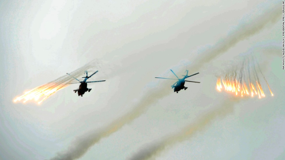 Russian Army helicopters fire flares over Sakhalin Island on July 16.
