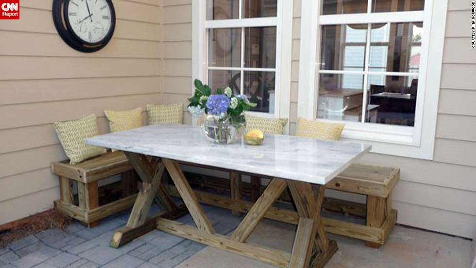 &lt;a href=&quot;http://ireport.cnn.com/docs/DOC-1003865&quot;&gt;Rina Norwood&lt;/a&gt; enjoys dining al fresco in the corner of her patio where she built a banquette and used salvage marble as a table top.