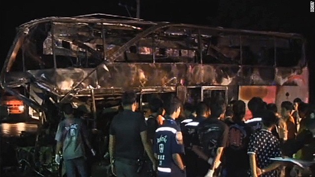 Charred remains of the ill-fated bus that crashed in central Thailand on Tuesday.