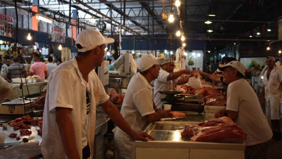 A busy fish market in Manaus, a city that consumes more fish per person per year than the entire rest of Brazil, and includes fish from the Rio Negro and Amazon Rivers not found in any other part of the world.