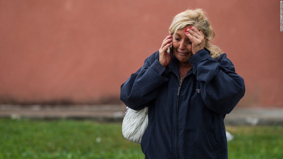 A relative of one of the passengers waits to hear news in Santiago de Compostela on July 25.