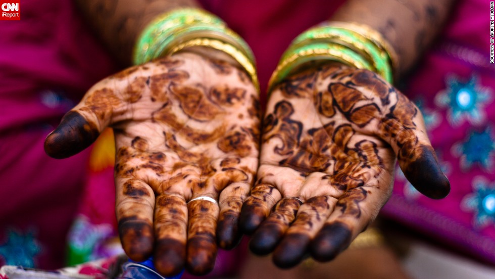 During an Eid spent in India, Laurens Meulman, 35, from the Netherlands, spotted an irresistible photo-opportunity after she&#39;d been invited to share food with a family in a square behind the Taj Mahal. &quot;The henna-painted hands of one of the women in the group caught my eye and I asked her if I could to take a photo,&quot; she said.  