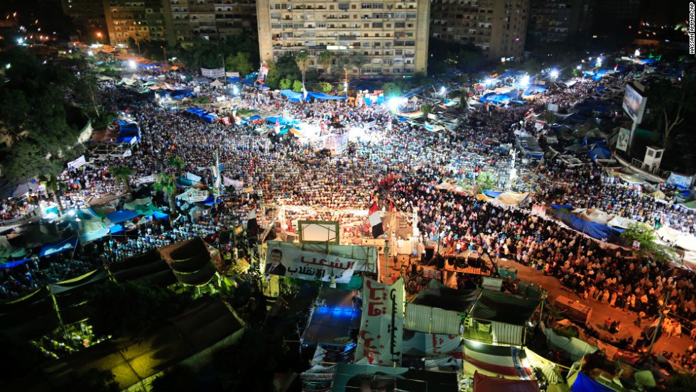 Supporters of Egypt&#39;s deposed President Mohammed Morsy gather for prayers at Nasr City, where protesters have installed a camp and hold daily rallies, in Cairo, on Sunday, July 28.