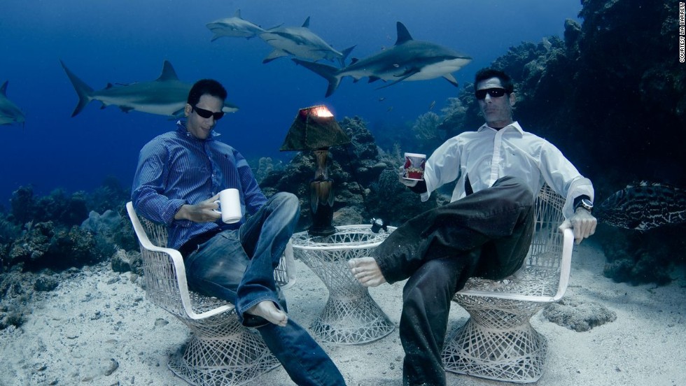 See those sharks swimming in the backgroud? Yep, they&#39;re real. The casually dressed men sipping coffee underwater? Real too. Welcome to the remarkable real life water world.