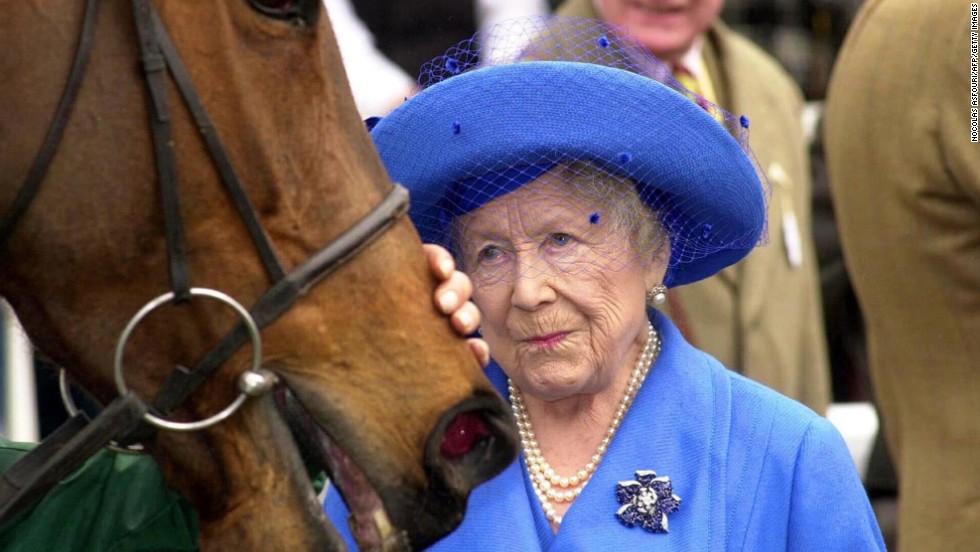 The late Queen Mother pats one of her winning horses Bella Macrae after a r...