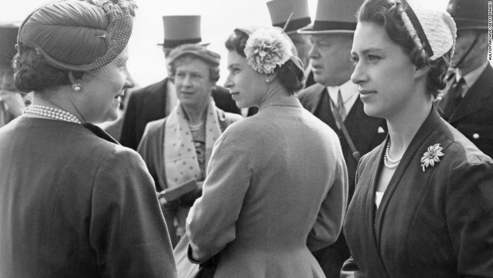 Here Queen Elizabeth is flanked by her mother and her late sister Princess Margaret (right) at the Epsom Derby in 1955.  