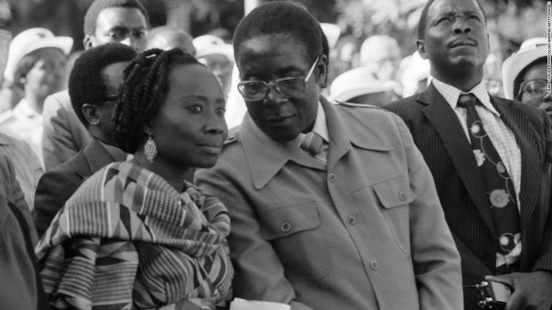Mugabe speaks with his first wife, Sally, during an event in Salisbury in 1980. The pair were married until Sally died in 1992. They had one son, who died at age 4.