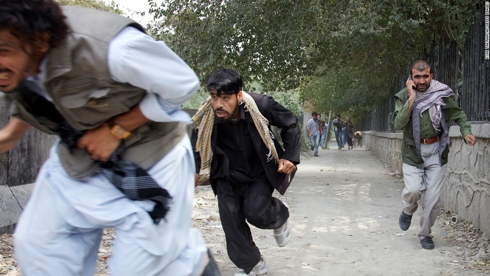People flee the scene of a Taliban attack on the &lt;a href=&quot;http://news.blogs.cnn.com/2011/09/13/u-s-embassy-in-afghanistan-attacked-taliban-claims-responsibility/&quot;&gt;U.S. Embassy in Kabul, Afghanistan,&lt;/a&gt; on September 13, 2011. Three police officers and one civilian were killed. There were no reports of U.S. casualties.