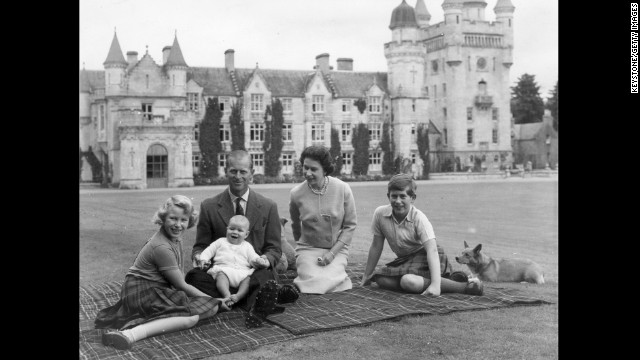 In this September 1960 photo, the Queen and Prince Philip pose on the Balmoral Lawn with their children, Prince Andrew, center, Princess Anne, left, and Prince Charles.