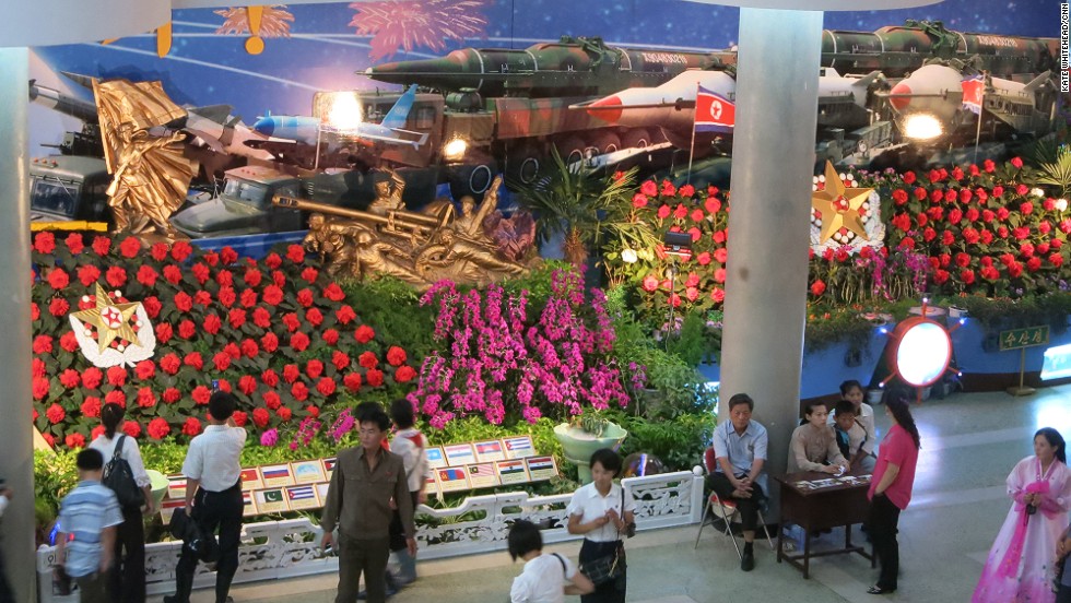 North Koreans are big on military motifs and this year they&#39;ve gone to town. Even a flower show features scores of missiles and tanks tucked in among the red &quot;Kimjongilia&quot; blossoms. 