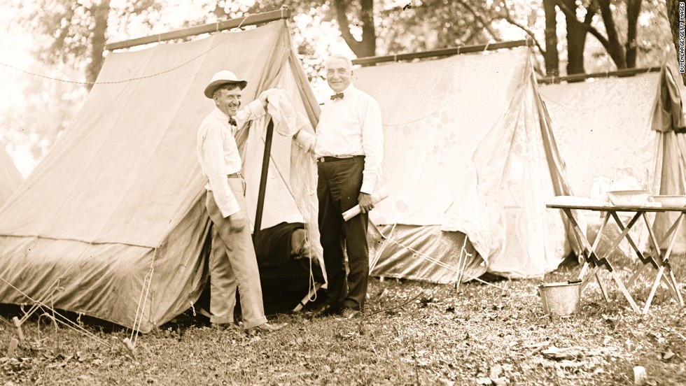 President Warren Harding, right, goes camping with Firestone Tire founder Harvey Firestone in 1921.