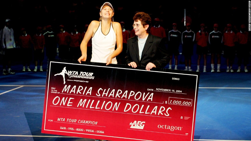 King presents Maria Sharapova with a check for $1 million after the Russian superstar won the WTA Championships in 2004 --  beating Serena Wiliams in the final.