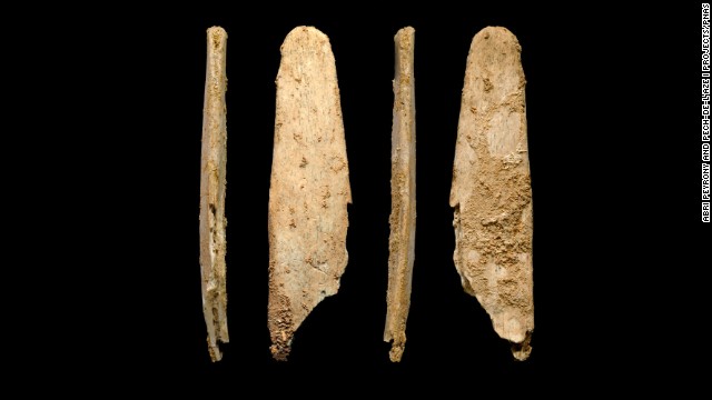 These are four views of the most complete lissoir bone tool found during excavations at the Neanderthal site of Abri Peyrony, France.