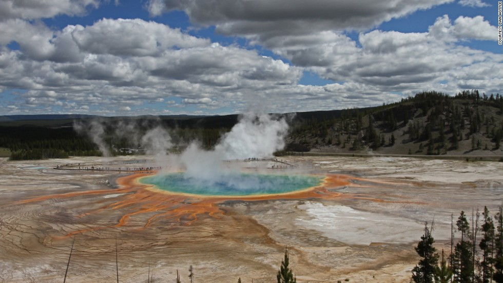 Grand Prismatic Spring is Hottle&#39;s favorite spring in the park, and it&#39;s in Midway Geyser Basin about five miles from Old Faithful. When the light is right, hike up one of the mountains surrounding the spring and you&#39;ll see the steam change colors because of the spring&#39;s bacteria.   