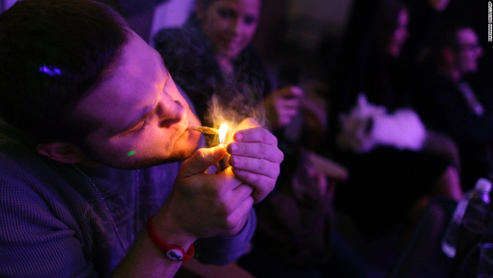 A man smokes a joint during the official opening night of Club 64, a marijuana social club in Denver, on New Year&#39;s Eve 2012. Voters in &lt;a href=&quot;http://www.cnn.com/2012/11/07/politics/marijuana-legalization/index.html&quot;&gt;Colorado and Washington state&lt;/a&gt; passed referendums to legalize recreational marijuana on November 6, 2012.