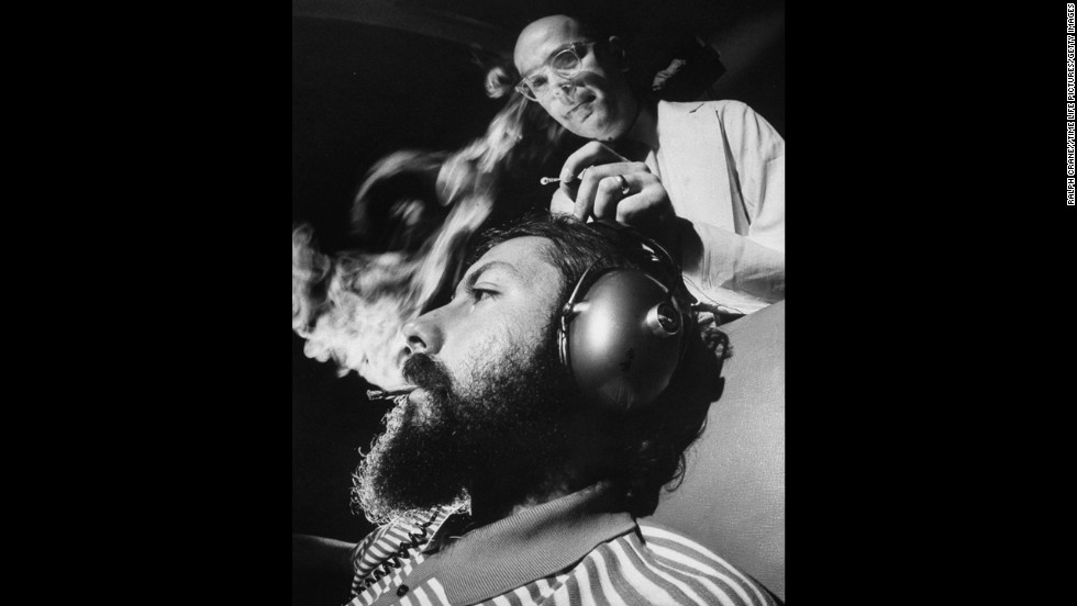 Research scientist Dr. Reese T. Jones, right, adjusts the electrodes monitoring a volunteer&#39;s brain response to sound during an experiment in 1969 that used a controlled dosage of marijuana. The tests were conducted at the Langley Porter Institute at the University of California, San Francisco.