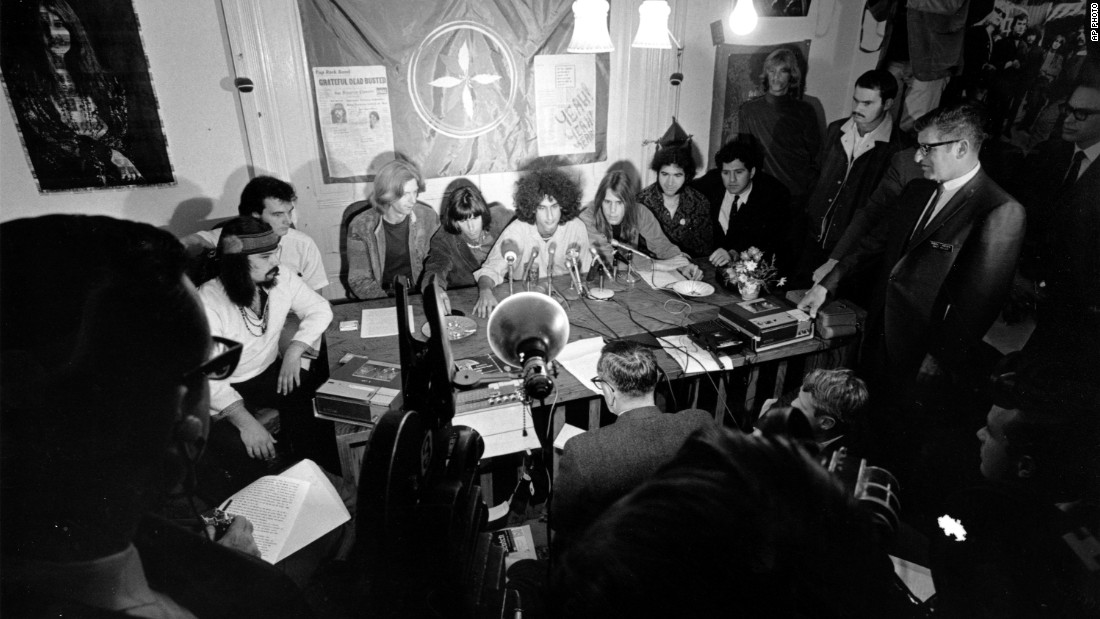 Members of the Grateful Dead talk with reporters from their home in San Francisco on October 5, 1967. The band was protesting being arrested for marijuana possession.