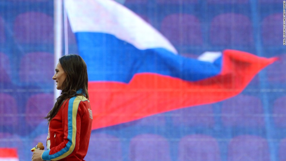 Russian pole vault star Yelena Isinbayeva launched a staunch defense of her country&#39;s new anti-gay laws after receiving her gold medal at the World Athletics Championships in Moscow Thursday. 