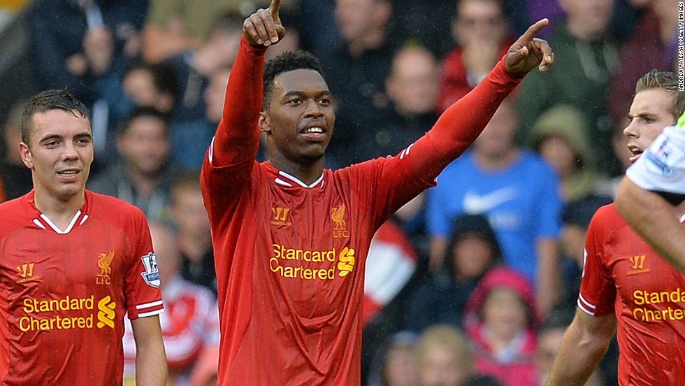 Daniel Sturridge celebrates after scoring Liverpool&#39;s opening goal at Anfield on Saturday.