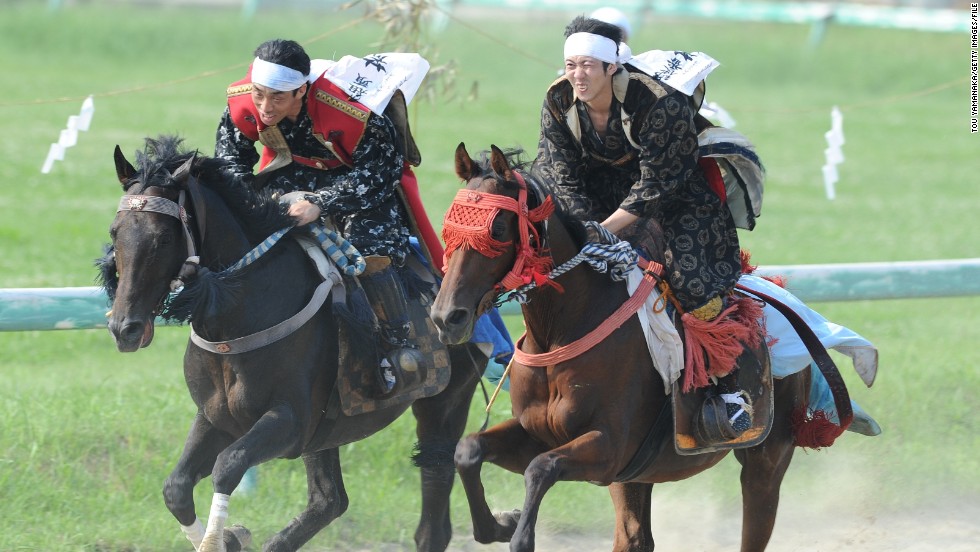 The elaborately attired warriors continue at Soma-Nomaoi festival in Japan, where samurai horsemen go head-to-head in three days of competitions.  